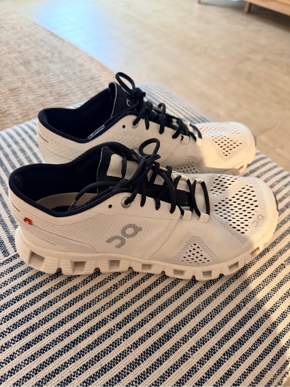 On Running Women’s White and Black Sneakers